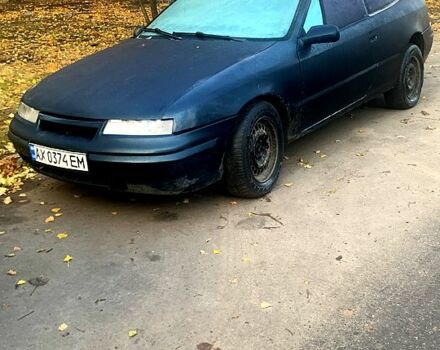 Синій Опель Калібра, об'ємом двигуна 1.6 л та пробігом 160 тис. км за 2000 $, фото 5 на Automoto.ua