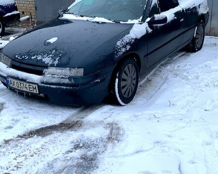 Синій Опель Калібра, об'ємом двигуна 1.6 л та пробігом 160 тис. км за 2000 $, фото 4 на Automoto.ua