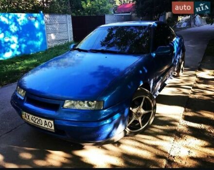 Синий Опель Калибра, объемом двигателя 2 л и пробегом 280 тыс. км за 2500 $, фото 3 на Automoto.ua