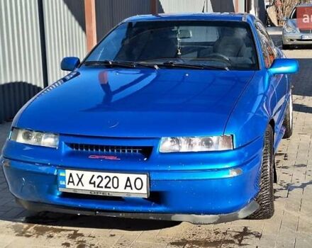 Синий Опель Калибра, объемом двигателя 2 л и пробегом 280 тыс. км за 2500 $, фото 2 на Automoto.ua