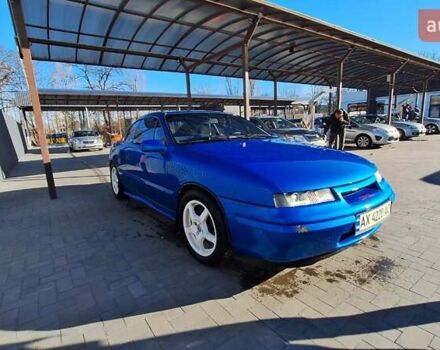 Синий Опель Калибра, объемом двигателя 2 л и пробегом 280 тыс. км за 2500 $, фото 6 на Automoto.ua