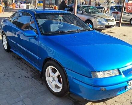 Синий Опель Калибра, объемом двигателя 2 л и пробегом 280 тыс. км за 2500 $, фото 7 на Automoto.ua