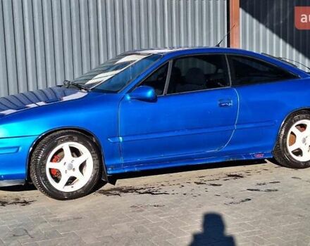 Синий Опель Калибра, объемом двигателя 2 л и пробегом 280 тыс. км за 2500 $, фото 5 на Automoto.ua