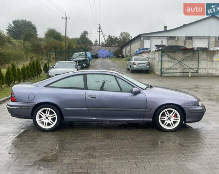 Синій Опель Калібра, об'ємом двигуна 3.2 л та пробігом 170 тис. км за 4500 $, фото 14 на Automoto.ua