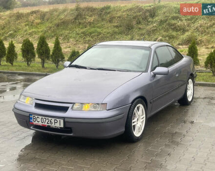 Синій Опель Калібра, об'ємом двигуна 3.2 л та пробігом 170 тис. км за 4500 $, фото 1 на Automoto.ua