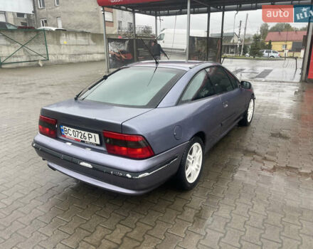 Синій Опель Калібра, об'ємом двигуна 3.2 л та пробігом 170 тис. км за 4300 $, фото 11 на Automoto.ua