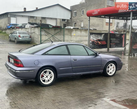 Синій Опель Калібра, об'ємом двигуна 3.2 л та пробігом 170 тис. км за 4300 $, фото 13 на Automoto.ua