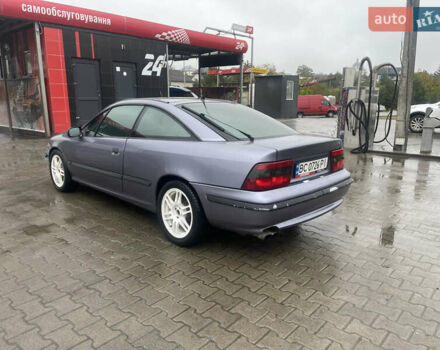 Синій Опель Калібра, об'ємом двигуна 3.2 л та пробігом 170 тис. км за 4500 $, фото 7 на Automoto.ua