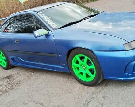 Синій Опель Калібра, об'ємом двигуна 2 л та пробігом 300 тис. км за 3400 $, фото 2 на Automoto.ua