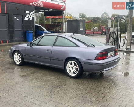 Синій Опель Калібра, об'ємом двигуна 3.2 л та пробігом 170 тис. км за 4500 $, фото 5 на Automoto.ua