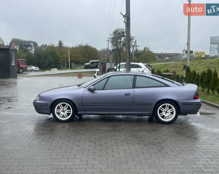 Синій Опель Калібра, об'ємом двигуна 3.2 л та пробігом 170 тис. км за 4300 $, фото 4 на Automoto.ua