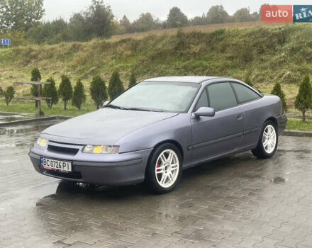 Синій Опель Калібра, об'ємом двигуна 3.2 л та пробігом 170 тис. км за 4300 $, фото 2 на Automoto.ua