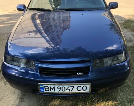 Синій Опель Калібра, об'ємом двигуна 2.5 л та пробігом 270 тис. км за 3200 $, фото 1 на Automoto.ua