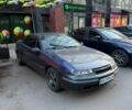 Синій Опель Калібра, об'ємом двигуна 2 л та пробігом 450 тис. км за 2500 $, фото 1 на Automoto.ua