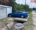 Синий Опель Калибра, объемом двигателя 2 л и пробегом 250 тыс. км за 4200 $, фото 1 на Automoto.ua