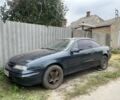Синий Опель Калибра, объемом двигателя 3 л и пробегом 125 тыс. км за 651 $, фото 1 на Automoto.ua