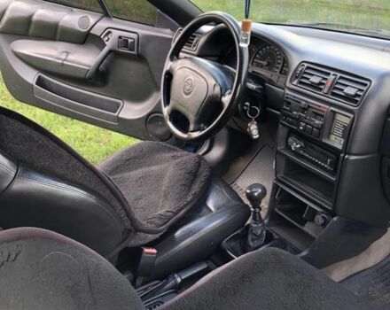 Синий Опель Калибра, объемом двигателя 2 л и пробегом 300 тыс. км за 3000 $, фото 3 на Automoto.ua