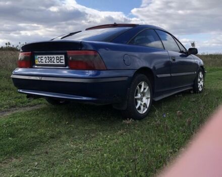 Синий Опель Калибра, объемом двигателя 2 л и пробегом 300 тыс. км за 3000 $, фото 1 на Automoto.ua