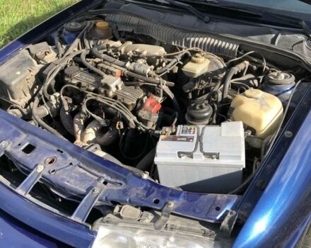 Синий Опель Калибра, объемом двигателя 2 л и пробегом 300 тыс. км за 3000 $, фото 4 на Automoto.ua