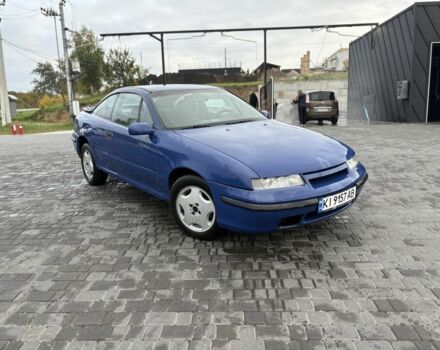 Синий Опель Калибра, объемом двигателя 2 л и пробегом 400 тыс. км за 2500 $, фото 1 на Automoto.ua