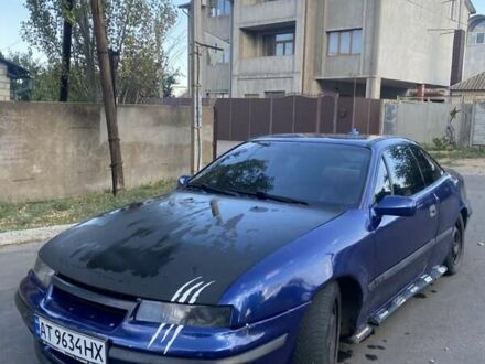 Синій Опель Калібра, об'ємом двигуна 2 л та пробігом 300 тис. км за 1600 $, фото 1 на Automoto.ua