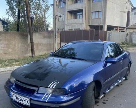 Синій Опель Калібра, об'ємом двигуна 2 л та пробігом 300 тис. км за 1600 $, фото 1 на Automoto.ua