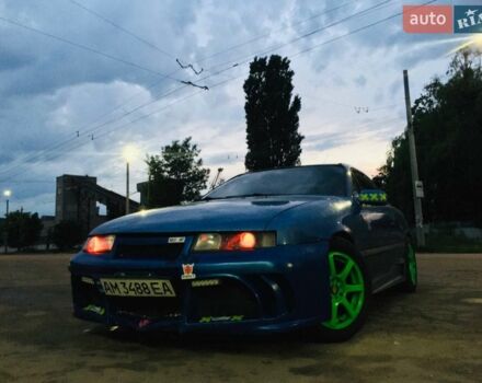 Синий Опель Калибра, объемом двигателя 2 л и пробегом 300 тыс. км за 3400 $, фото 1 на Automoto.ua