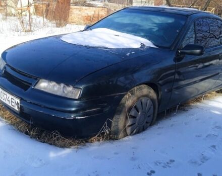 Синий Опель Калибра, объемом двигателя 1.6 л и пробегом 123 тыс. км за 810 $, фото 1 на Automoto.ua