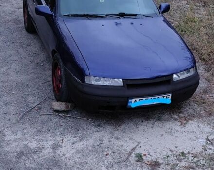 Синій Опель Калібра, об'ємом двигуна 2 л та пробігом 255 тис. км за 2000 $, фото 1 на Automoto.ua