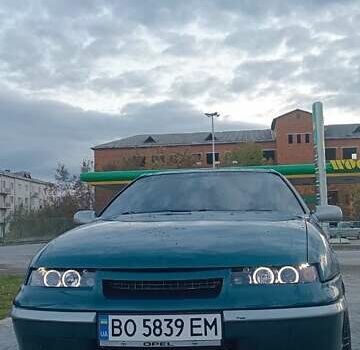 Зеленый Опель Калибра, объемом двигателя 2 л и пробегом 365 тыс. км за 2200 $, фото 2 на Automoto.ua