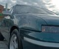 Зеленый Опель Калибра, объемом двигателя 2 л и пробегом 365 тыс. км за 1800 $, фото 1 на Automoto.ua