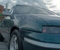 Зеленый Опель Калибра, объемом двигателя 2 л и пробегом 365 тыс. км за 2200 $, фото 1 на Automoto.ua