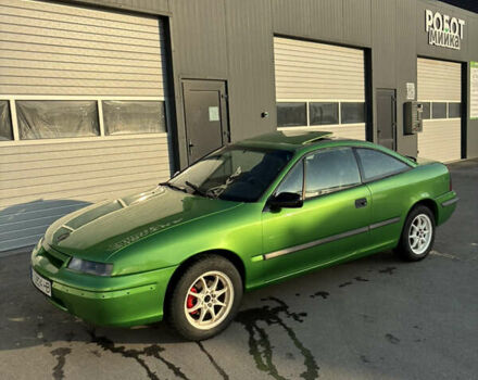 Зеленый Опель Калибра, объемом двигателя 2 л и пробегом 280 тыс. км за 3000 $, фото 4 на Automoto.ua