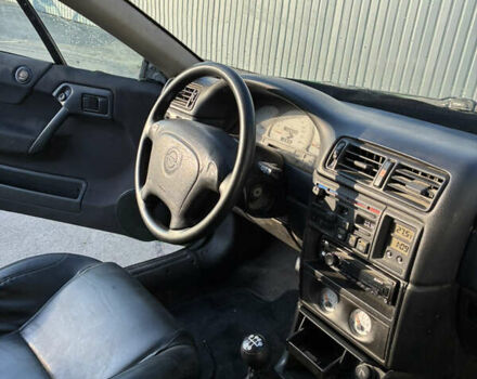 Зеленый Опель Калибра, объемом двигателя 2 л и пробегом 280 тыс. км за 3000 $, фото 12 на Automoto.ua