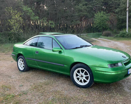 Зеленый Опель Калибра, объемом двигателя 2 л и пробегом 280 тыс. км за 3000 $, фото 9 на Automoto.ua