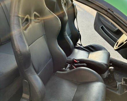 Зеленый Опель Калибра, объемом двигателя 2 л и пробегом 280 тыс. км за 3000 $, фото 11 на Automoto.ua