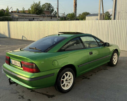 Зеленый Опель Калибра, объемом двигателя 2 л и пробегом 280 тыс. км за 3000 $, фото 1 на Automoto.ua