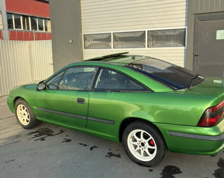 Зеленый Опель Калибра, объемом двигателя 2 л и пробегом 280 тыс. км за 3000 $, фото 3 на Automoto.ua