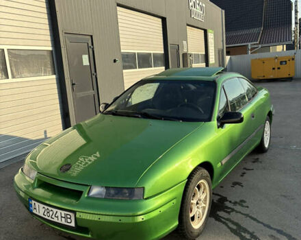 Зеленый Опель Калибра, объемом двигателя 2 л и пробегом 280 тыс. км за 3000 $, фото 5 на Automoto.ua
