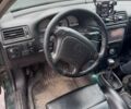 Зелений Опель Калібра, об'ємом двигуна 2 л та пробігом 350 тис. км за 2750 $, фото 8 на Automoto.ua