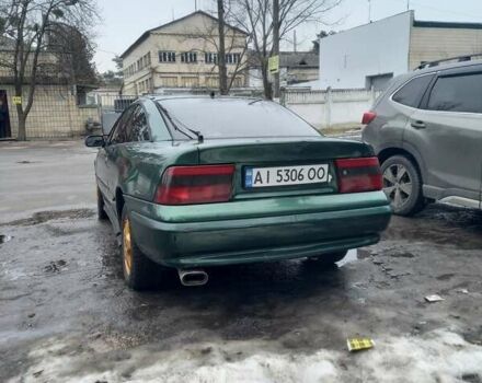Зелений Опель Калібра, об'ємом двигуна 2 л та пробігом 350 тис. км за 2750 $, фото 1 на Automoto.ua