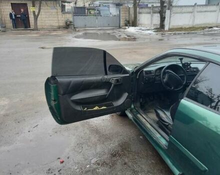 Зелений Опель Калібра, об'ємом двигуна 2 л та пробігом 350 тис. км за 2750 $, фото 7 на Automoto.ua