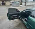 Зелений Опель Калібра, об'ємом двигуна 2 л та пробігом 350 тис. км за 2750 $, фото 7 на Automoto.ua