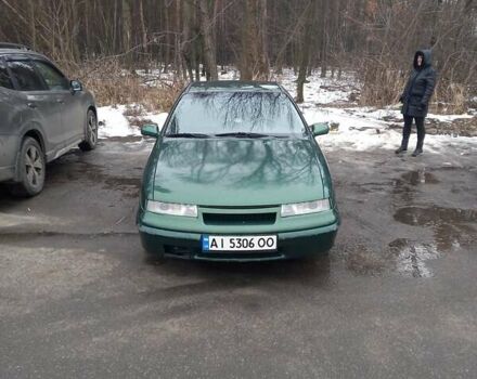 Зелений Опель Калібра, об'ємом двигуна 2 л та пробігом 350 тис. км за 2750 $, фото 2 на Automoto.ua