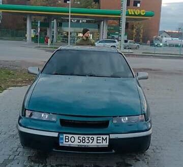 Зелений Опель Калібра, об'ємом двигуна 2 л та пробігом 365 тис. км за 2200 $, фото 1 на Automoto.ua