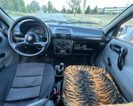 Белый Опель Кампо, объемом двигателя 1.4 л и пробегом 250 тыс. км за 1550 $, фото 4 на Automoto.ua