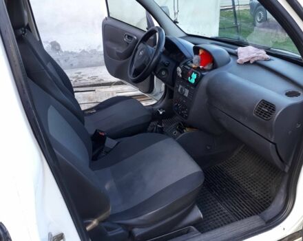 Белый Опель Кампо, объемом двигателя 1.3 л и пробегом 300 тыс. км за 3500 $, фото 5 на Automoto.ua