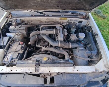 Белый Опель Кампо, объемом двигателя 3.1 л и пробегом 211 тыс. км за 3810 $, фото 6 на Automoto.ua