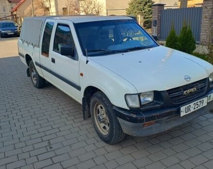 Белый Опель Кампо, объемом двигателя 3.1 л и пробегом 211 тыс. км за 3810 $, фото 2 на Automoto.ua