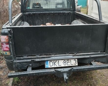 Черный Опель Кампо, объемом двигателя 2.7 л и пробегом 340 тыс. км за 949 $, фото 2 на Automoto.ua